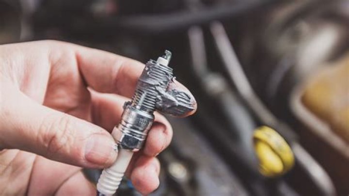 Can spark plugs cause car to jerk?