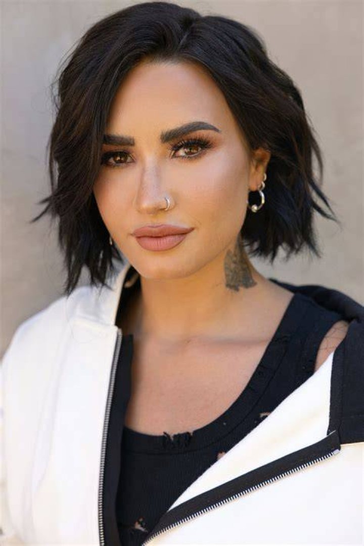 What is Demi Lovato's range?